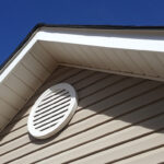 Closeup of a roof vent on a house.