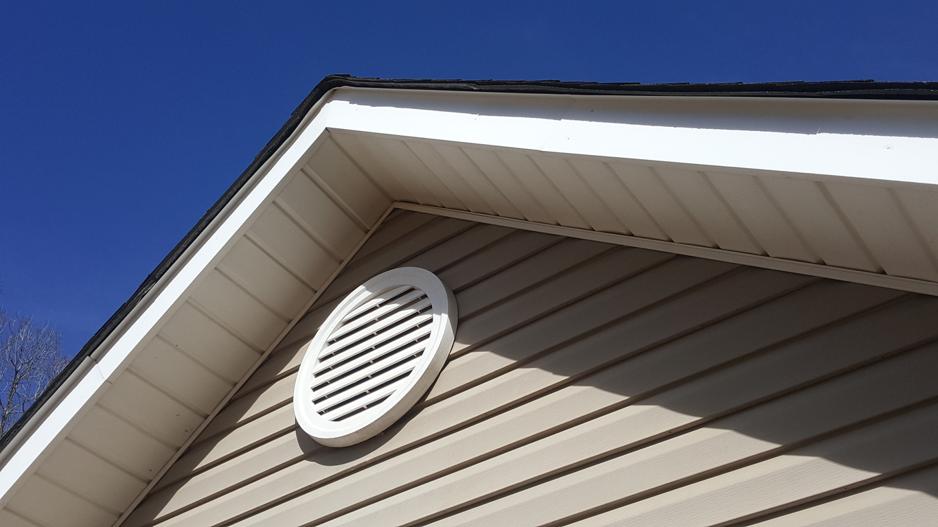 Closeup of a roof vent on a house.