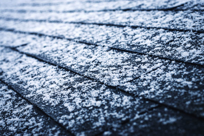 Asphalt shingles with snow