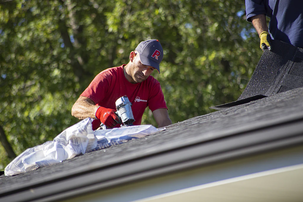 roofer fixing a roof