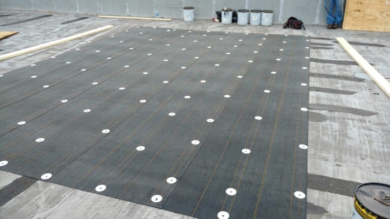 of leak repairs in progress on Commercial flat roof; roofing. roof leak repairs in process on a Commercial flat roof; roofing, TPO,